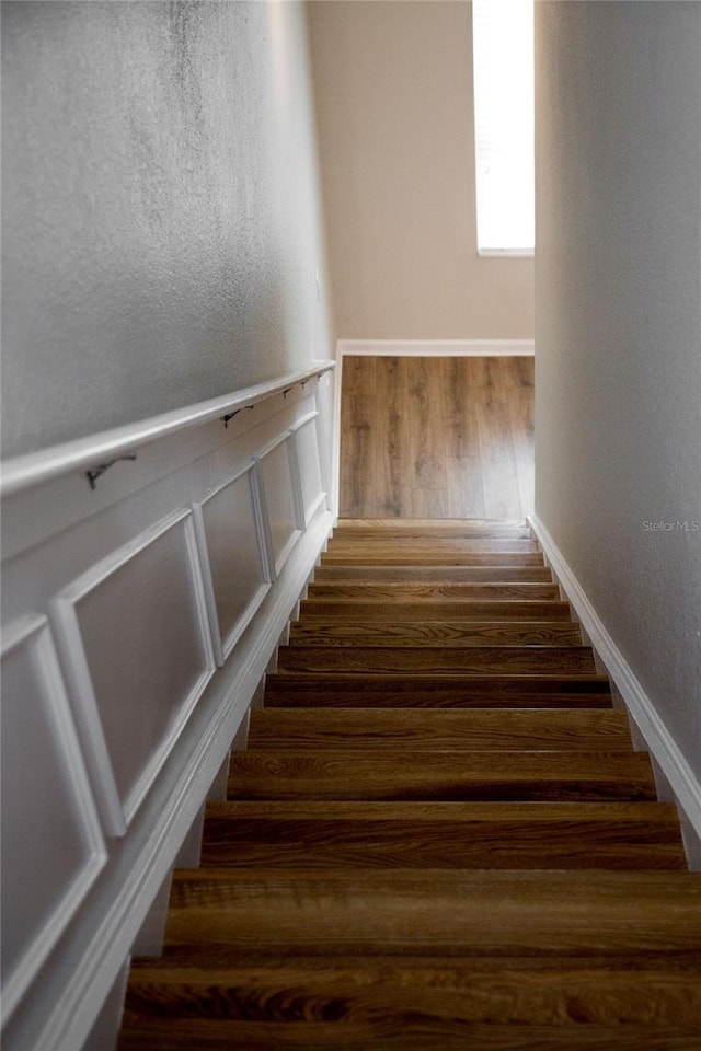8024 Cool Breeze Dr Unit 132, Orlando, FL 32819 - stairway with wood finished floors