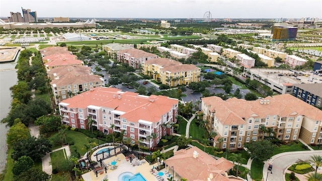 8024 Cool Breeze Dr Unit 132, Orlando, FL 32819 - aerial view of property and surrounding area featuring a pool area and apartment complex / building