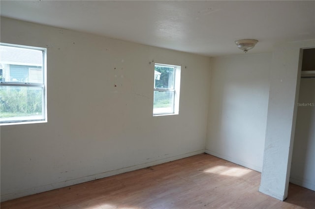 622 Booker, Lake Wales, FL 33853 - unfurnished room featuring light wood-style flooring and baseboards