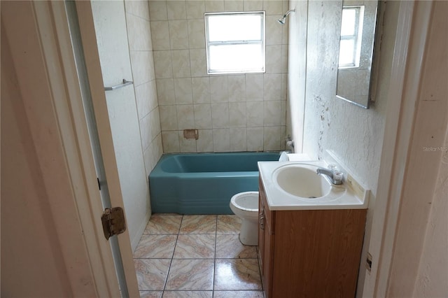 622 Booker, Lake Wales, FL 33853 - bathroom featuring toilet, vanity, and shower / bathtub combination