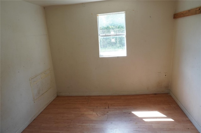 622 Booker, Lake Wales, FL 33853 - spare room featuring light wood-style flooring and baseboards
