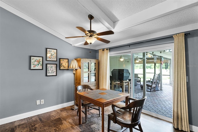 526 Sabal Trail Cir, Longwood, FL 32779 - dining area with a ceiling fan, a textured ceiling, and beam ceiling