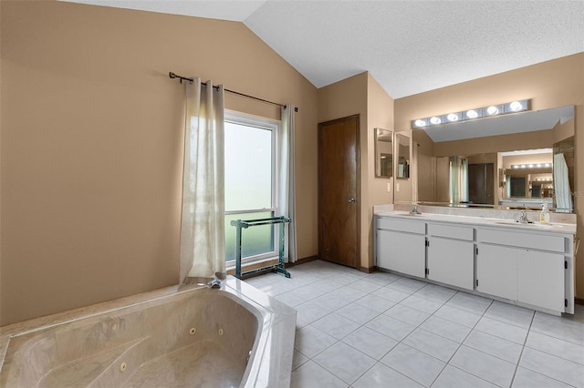 526 Sabal Trail Cir, Longwood, FL 32779 - bathroom featuring vaulted ceiling, double vanity, a jetted tub, and tile patterned floors