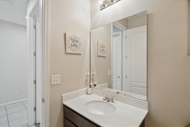 914 Fallon Hills Dr, Haines City, FL 33844 - bathroom with vanity and tile patterned floors