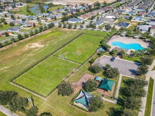914 Fallon Hills Dr, Haines City, FL 33844 - aerial view of property and surrounding area featuring a pool and a large body of water