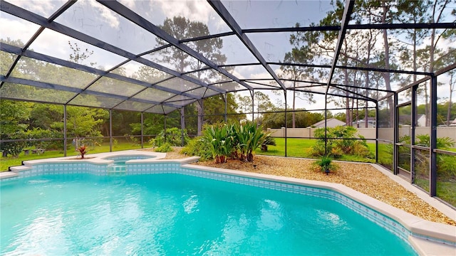 10747 Satinwood Cir, Orlando, FL 32825 - view of swimming pool featuring a pool with connected hot tub and glass enclosure