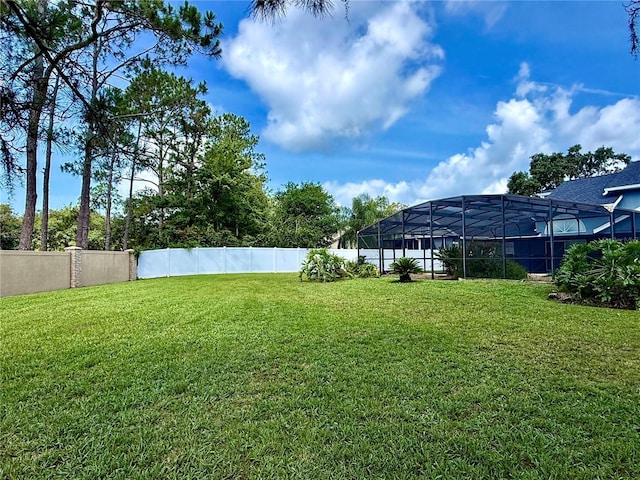 10747 Satinwood Cir, Orlando, FL 32825 - view of yard with a lanai