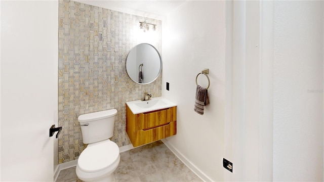 10747 Satinwood Cir, Orlando, FL 32825 - bathroom featuring vanity, toilet, and baseboards