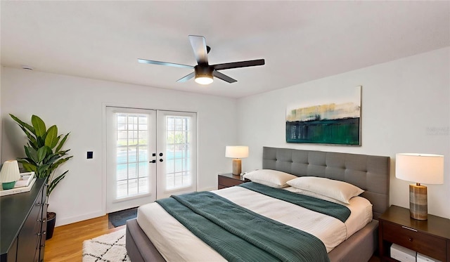 10747 Satinwood Cir, Orlando, FL 32825 - bedroom with access to exterior, french doors, light wood finished floors, baseboards, and ceiling fan