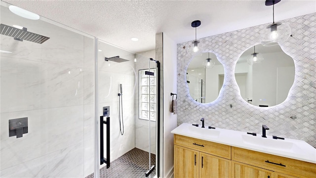 10747 Satinwood Cir, Orlando, FL 32825 - full bath featuring tile walls, a shower stall, double vanity, a textured ceiling, and tile patterned floors