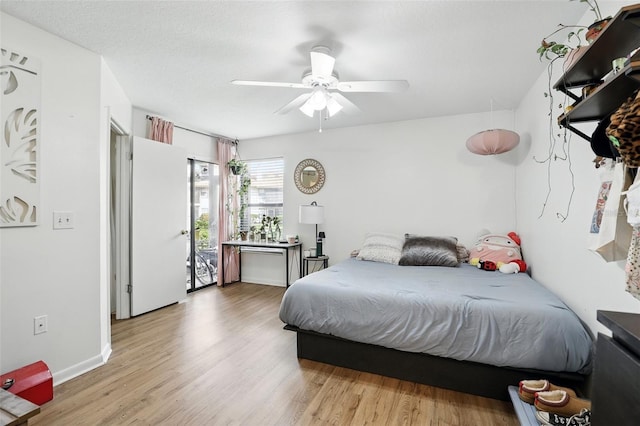 3012 S Semoran Blvd Unit S, Orlando, FL 32822 - bedroom featuring wood finished floors and a ceiling fan