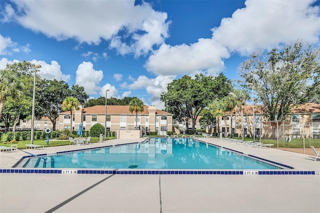 3012 S Semoran Blvd Unit S, Orlando, FL 32822 - community pool featuring a residential view