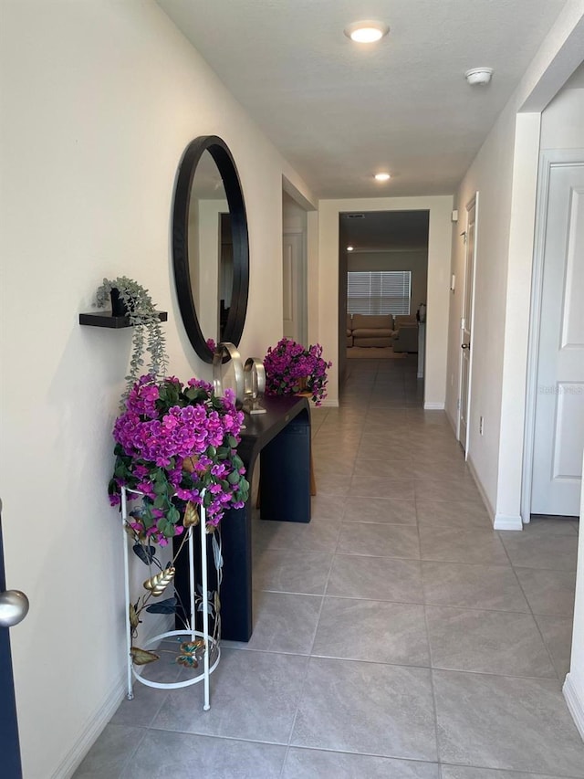 7172 SW 135th Pl, Ocala, FL 34473 - hall featuring light tile patterned floors, baseboards, and recessed lighting