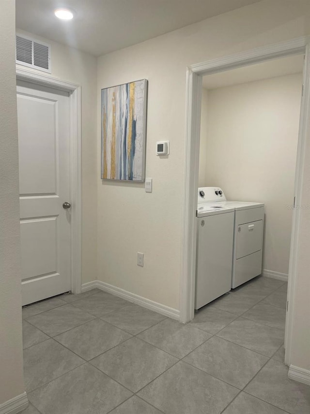 7172 SW 135th Pl, Ocala, FL 34473 - laundry room featuring light tile patterned floors and independent washer and dryer