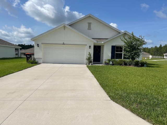 7172 SW 135th Pl, Ocala, FL 34473 - single story home with driveway, a garage, a front lawn, and stucco siding