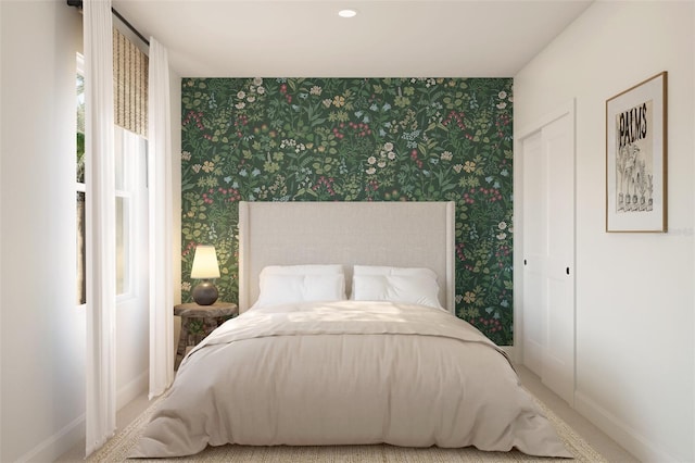 8231 N Wakefield Dr Unit 31, Dunnellon, FL 34434 - carpeted bedroom with wallpapered walls and baseboards