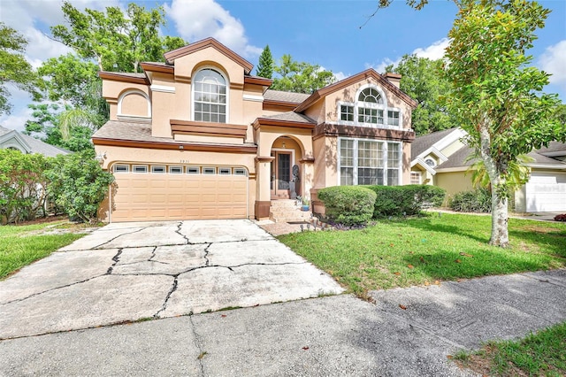 2971 Cayman Way, Orlando, FL 32812 - view of front of home featuring stucco siding, concrete driveway, a front yard, and a garage