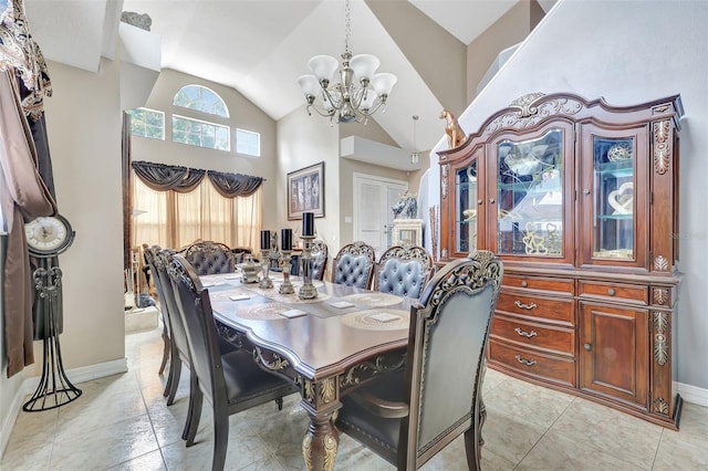 2971 Cayman Way, Orlando, FL 32812 - dining space with a chandelier, baseboards, and high vaulted ceiling