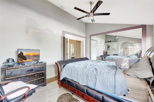 2971 Cayman Way, Orlando, FL 32812 - bedroom featuring lofted ceiling, light tile patterned floors, a ceiling fan, baseboards, and a closet