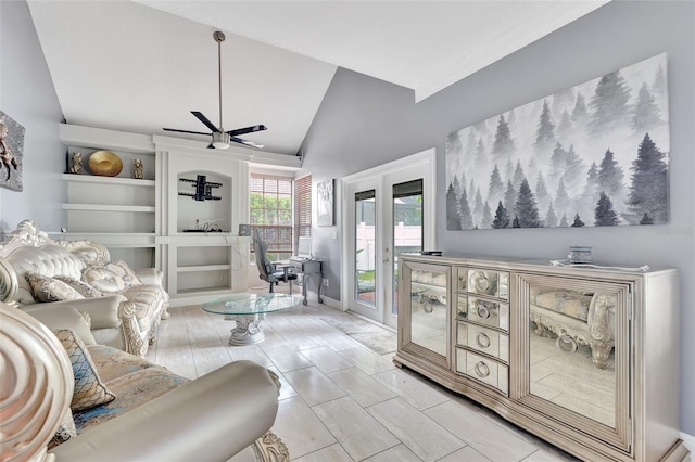 2971 Cayman Way, Orlando, FL 32812 - living room featuring a ceiling fan, french doors, and high vaulted ceiling