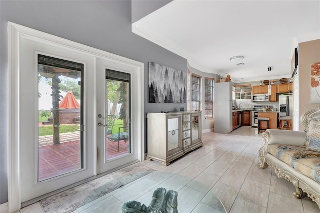 2971 Cayman Way, Orlando, FL 32812 - living area with ornamental molding and french doors
