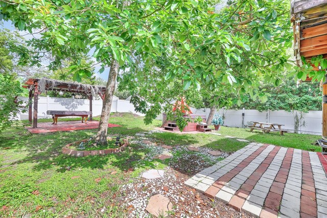 2971 Cayman Way, Orlando, FL 32812 - view of yard featuring a patio and a pergola