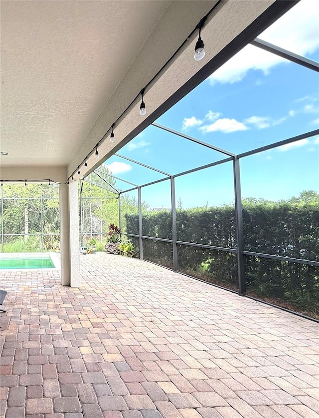 1016 Fountain Coin Loop, Orlando, FL 32828 - view of patio / terrace with a lanai and an outdoor pool