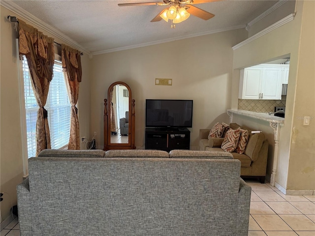 7104 Blue Earth Ct, Orlando, FL 32818 - living area featuring ornamental molding, a ceiling fan, light tile patterned floors, and baseboards