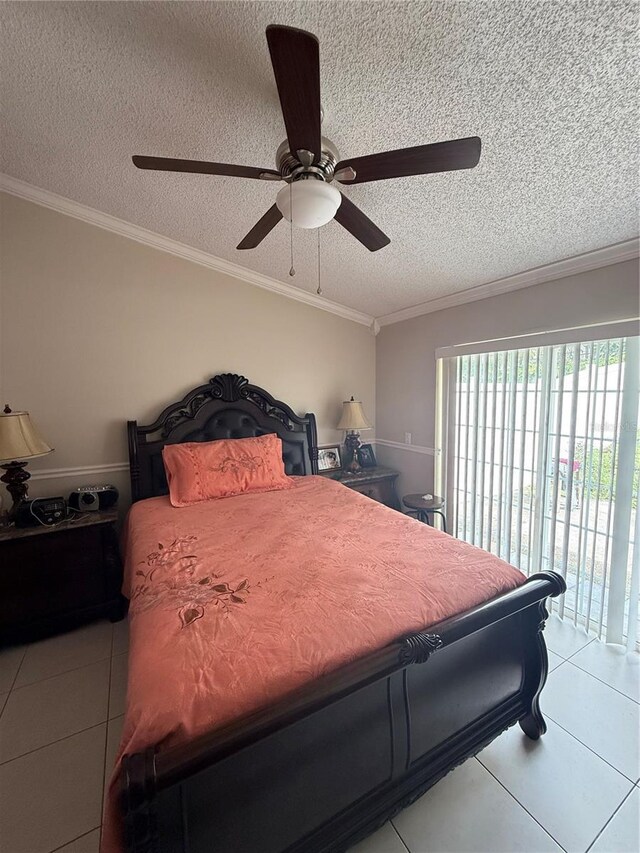 7104 Blue Earth Ct, Orlando, FL 32818 - tiled bedroom featuring a textured ceiling, ornamental molding, and a ceiling fan