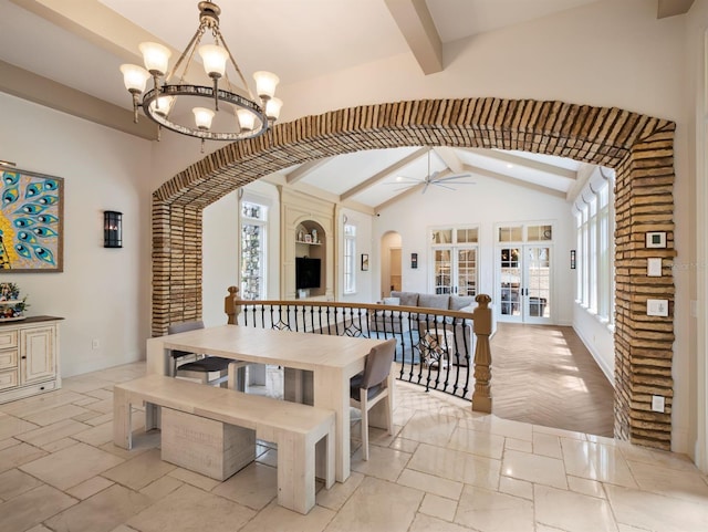 11106 Coniston Way, Windermere, FL 34786 - dining room with arched walkways, ceiling fan, a chandelier, and baseboards
