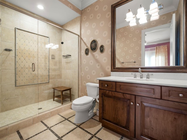 11106 Coniston Way, Windermere, FL 34786 - bathroom featuring toilet, a stall shower, vanity, wallpapered walls, and inlaid floor details