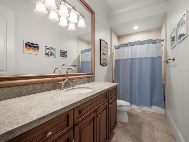 11106 Coniston Way, Windermere, FL 34786 - bathroom with vanity, toilet, tile patterned floors, baseboards, and ornamental molding