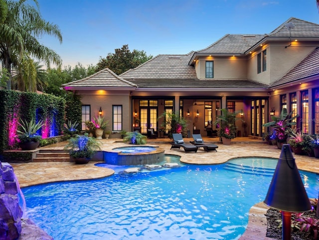 11106 Coniston Way, Windermere, FL 34786 - view of swimming pool featuring a patio and a pool with connected hot tub