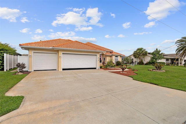 5 Florence Ct, Palm Coast, FL 32137 - view of front facade with concrete driveway, a tile roof, stucco siding, and an attached garage