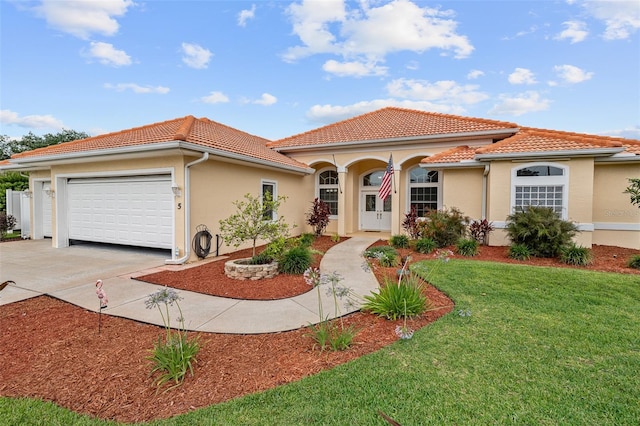 5 Florence Ct, Palm Coast, FL 32137 - mediterranean / spanish-style house with a tiled roof, a garage, concrete driveway, a front yard, and stucco siding