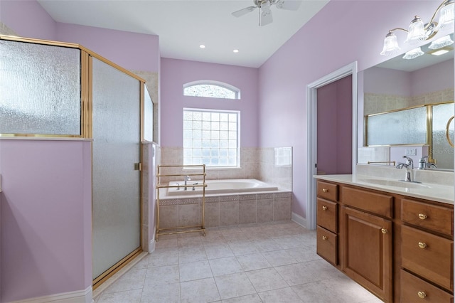 5 Florence Ct, Palm Coast, FL 32137 - bathroom featuring vanity, a bath, a ceiling fan, tile patterned flooring, and a shower stall