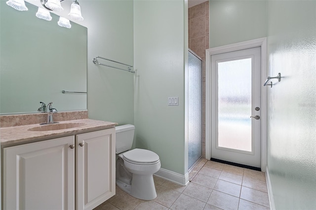 5 Florence Ct, Palm Coast, FL 32137 - bathroom featuring plenty of natural light, toilet, a stall shower, and tile patterned floors