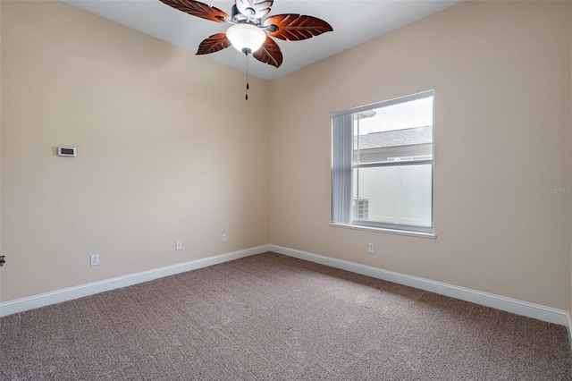 5 Florence Ct, Palm Coast, FL 32137 - spare room with a ceiling fan, carpet flooring, and baseboards
