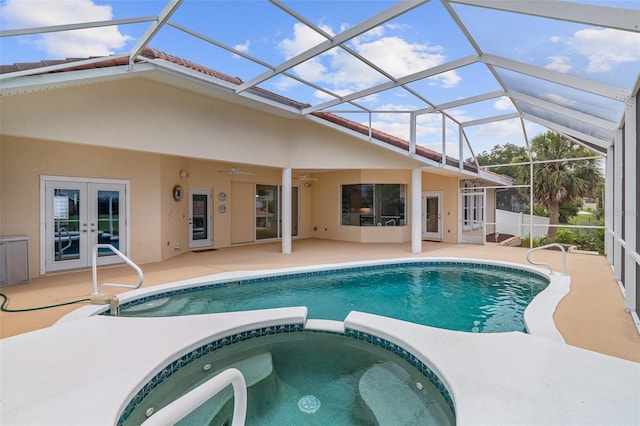 5 Florence Ct, Palm Coast, FL 32137 - view of pool featuring french doors, a patio area, a pool with connected hot tub, and a ceiling fan