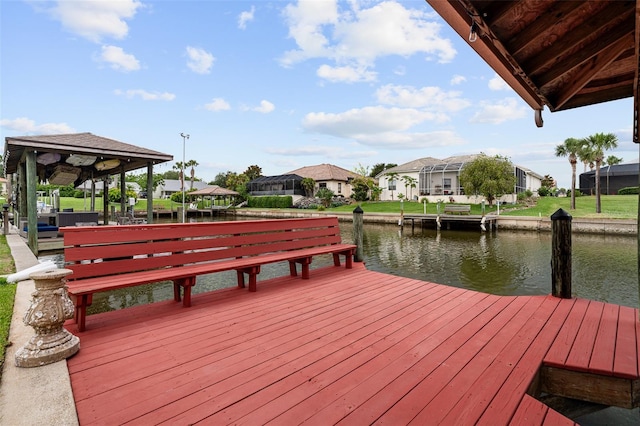 5 Florence Ct, Palm Coast, FL 32137 - dock with a water view, a residential view, and a gazebo