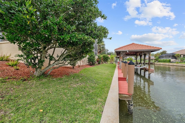 5 Florence Ct, Palm Coast, FL 32137 - dock area with a lawn and a water view