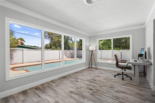 3251 Wickersham Ct, Orlando, FL 32806 - home office with a textured ceiling and wood finished floors