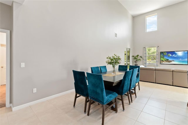 5639 Timber Meadow Way, Saint Cloud, FL 34771 - dining area featuring high vaulted ceiling and light tile patterned floors