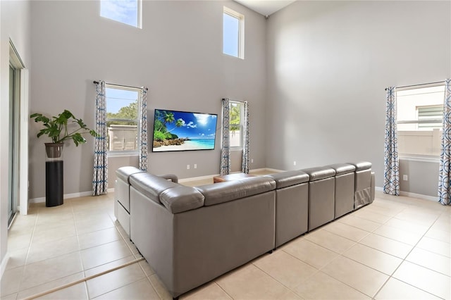 5639 Timber Meadow Way, Saint Cloud, FL 34771 - living room with a high ceiling, light tile patterned floors, and healthy amount of natural light