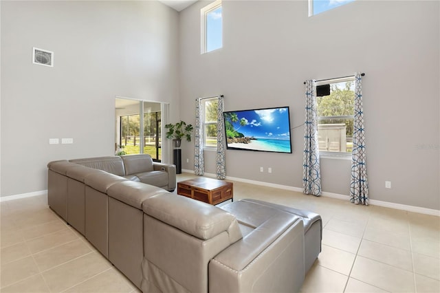 5639 Timber Meadow Way, Saint Cloud, FL 34771 - living room with a towering ceiling and light tile patterned floors