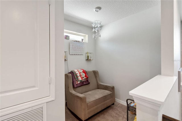 5639 Timber Meadow Way, Saint Cloud, FL 34771 - sitting room with light colored carpet and a textured ceiling