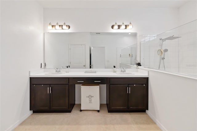 5639 Timber Meadow Way, Saint Cloud, FL 34771 - bathroom with double vanity, a walk in shower, and tile patterned floors
