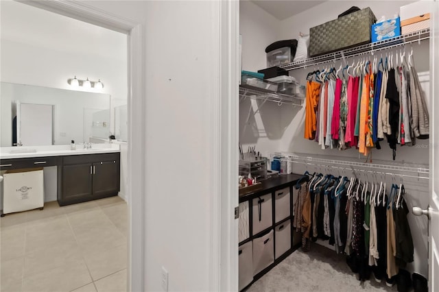5639 Timber Meadow Way, Saint Cloud, FL 34771 - walk in closet featuring light tile patterned flooring and a sink