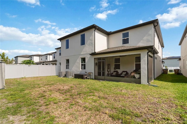 5639 Timber Meadow Way, Saint Cloud, FL 34771 - back of property with a sunroom and stucco siding