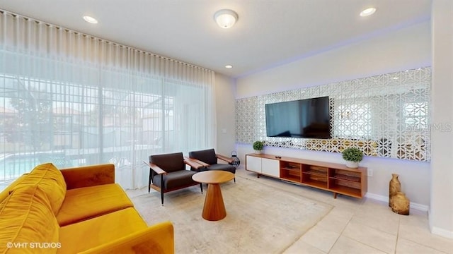 8900 Sydney Ave, Kissimmee, FL 34747 - tiled living room featuring recessed lighting